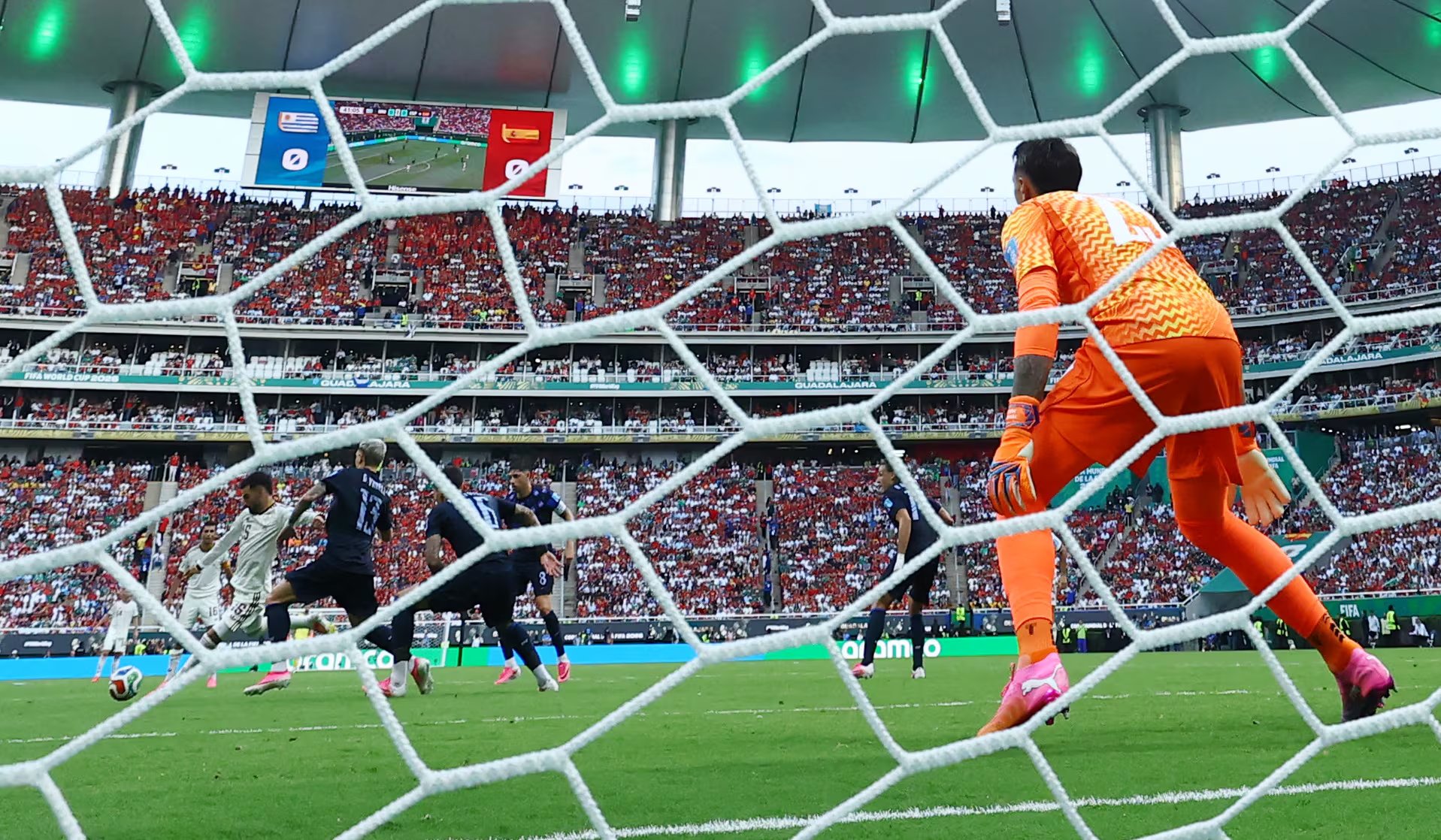 Soccer Football - FIFA World Cup 2026 - Group H - Uruguay v Spain - Estadio Guadalajara, Guadalajara, Mexico - June 26, 2026 Spain's Alex Baena scores their first goal past Uruguay's Fernando Muslera REUTERS/Eloisa Sanchez