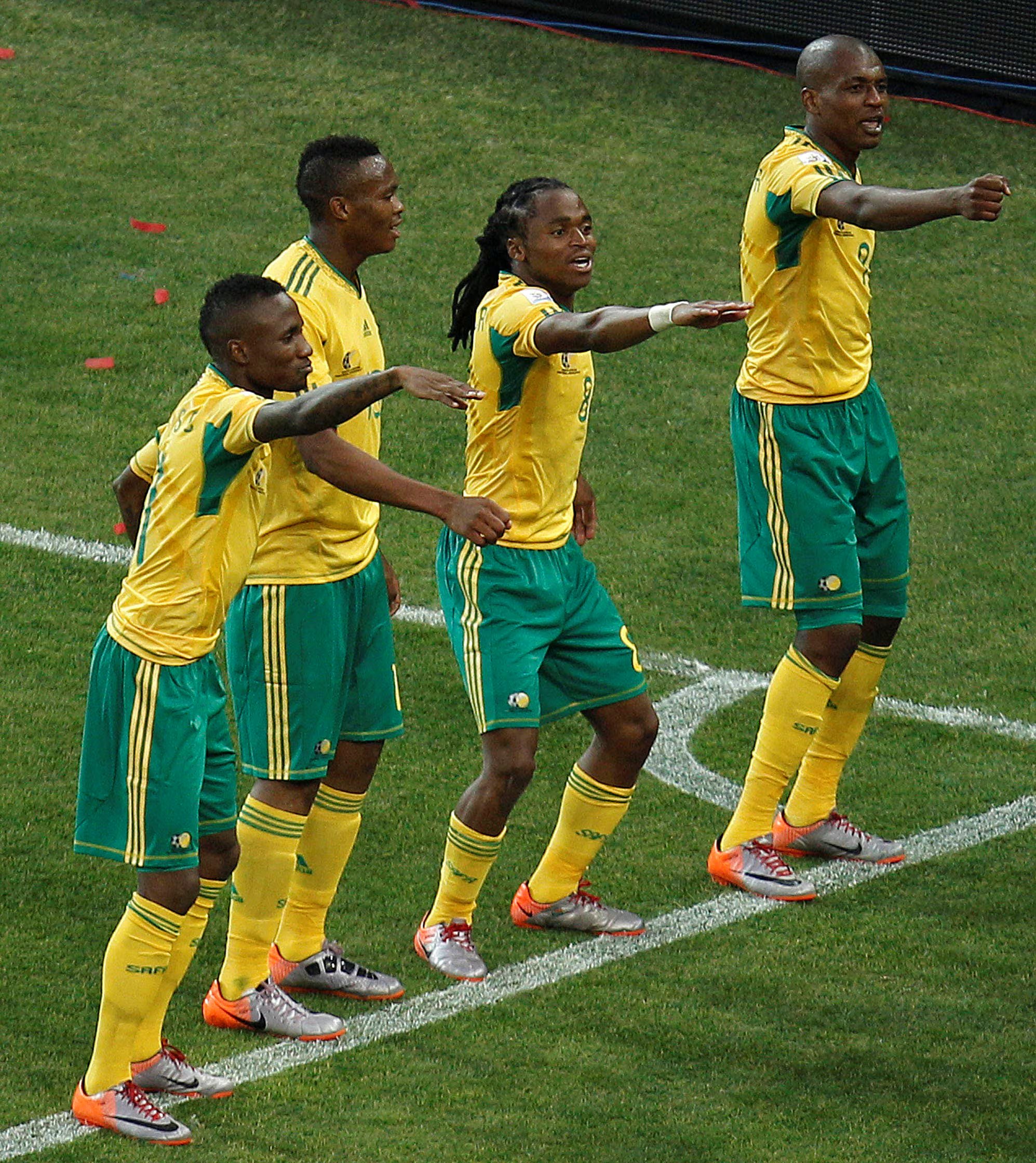FILE PHOTO: Football - South Africa v Mexico FIFA World Cup South Africa 2010 - Group A - Soccer City Stadium, Johannesburg, South Africa - 11/6/10 Siphiwe Tshabalala (2nd R) celebrates with his team mates after scoring South Africa's first goal Mandatory Credit: Action Images / Carl Recine/File Photo
