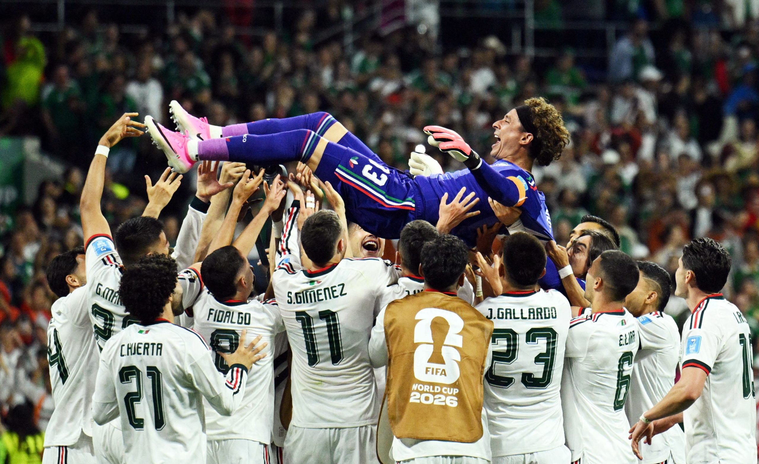 Soccer Football - FIFA World Cup 2026 - Group A - Czech Republic v Mexico - Estadio Azteca, Mexico City, Mexico - June 24, 2026 Mexico players throw Guillermo Ochoa in the air as they celebrate his first appearance in his sixth world cup REUTERS/Annegret Hilse