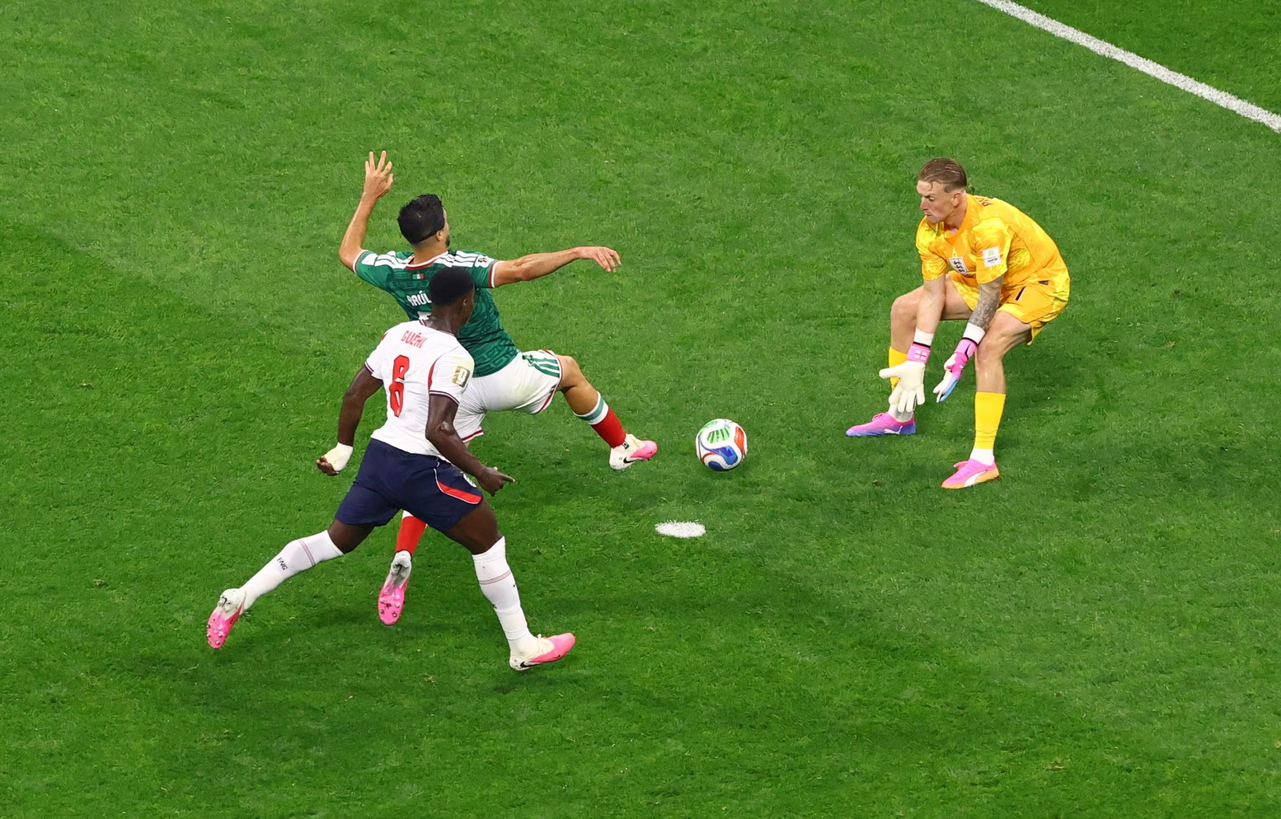 Soccer Football - FIFA World Cup 2026 - Round of 16 - Mexico v England - Estadio Azteca, Mexico City, Mexico - July 5, 2026 Mexico's Raul Jimenez in action with England's Jordan Pickford REUTERS/Henry Romero