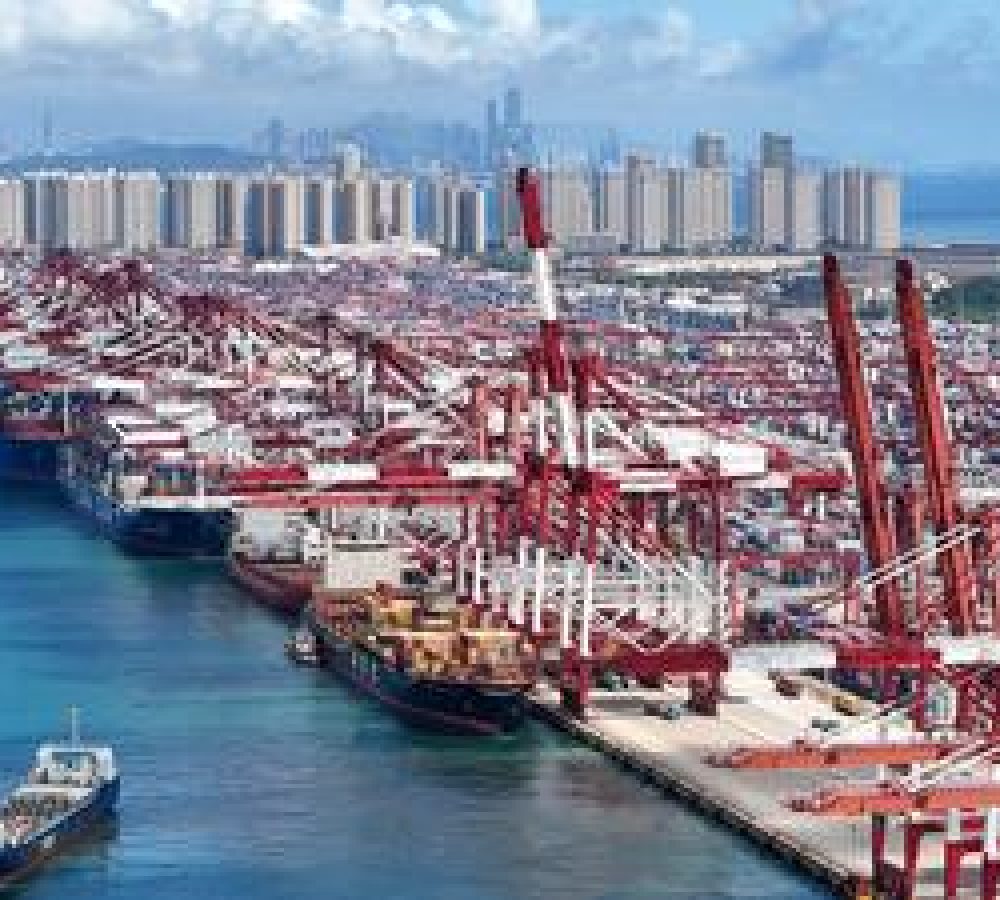 (260826) -- JINAN, Aug. 26, 2026 (Xinhua) -- A drone photo taken on Aug. 25, 2026 shows container ships berthed at the Qianwan Container Terminal of Qingdao Port in Qingdao, east China's Shandong Province. Cargo throughput of Qingdao Port reached 0.448 billion tonnes in the first seven months of 2026, up 3.2 percent year on year. The container throughput totaled 20.58 million TEUs, registering a year-on-year increase of 7.0 percent, data from the Ministry of Transport shows. (Photo by Zhang Jingang/Xinhua)